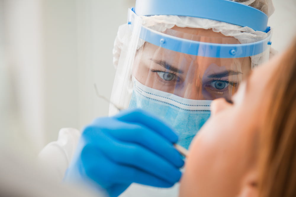 Dentist in a visor